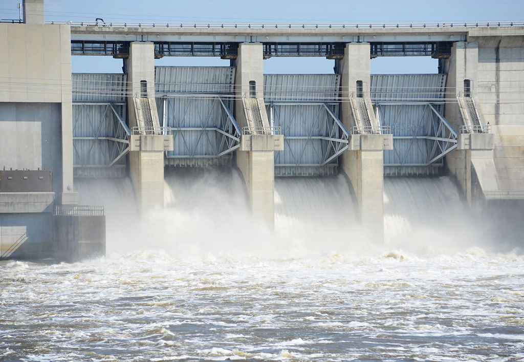 Water rushes through Truman Dam's four floodgates and into the Osage River